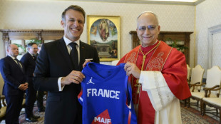 France's Macron talks war, peace and basketball with Pope Leo