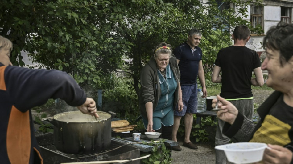La b&uacute;squeda desesperada por la comida en las zonas sitiadas por Rusia en el este de Ucrania
