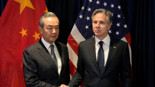 Wang tells Blinken to 'work with China' on improving US ties