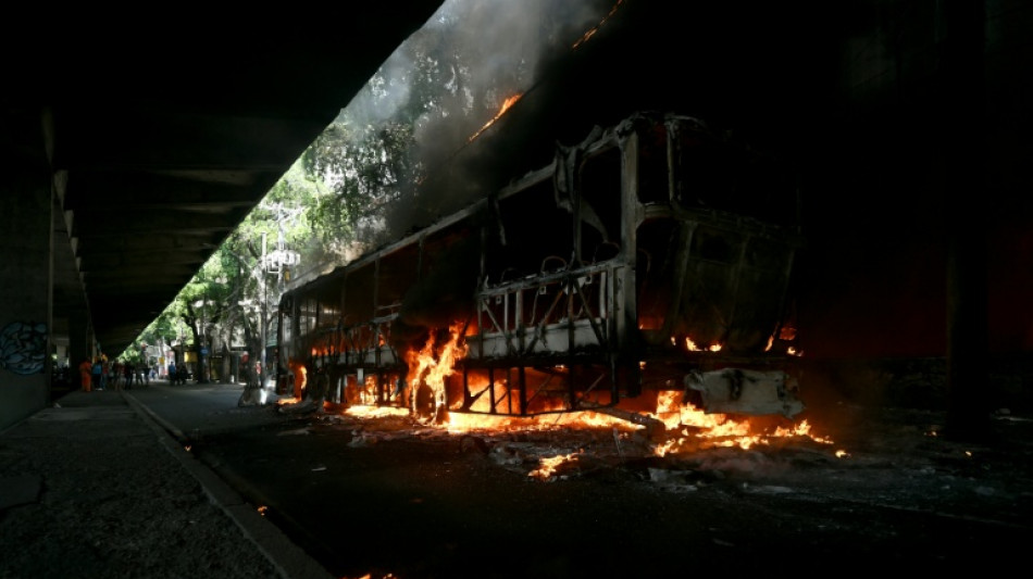 Rio de Janeiro's gangs hijack buses to sow chaos in war with police