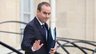 Euro slides as worries about French debt grow