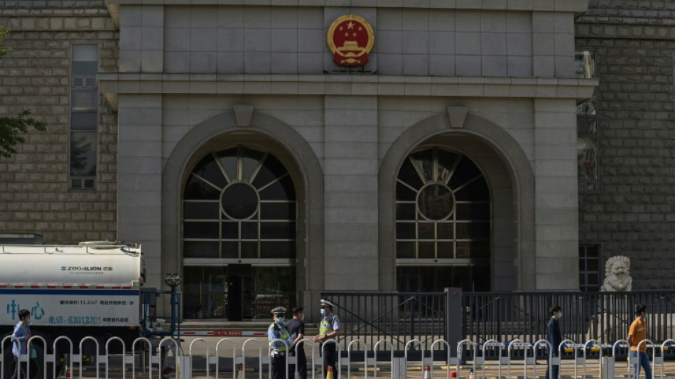 Australia says writer given suspended death sentence in China