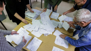Scholz's coalition counts cost of poll losses as far right gains