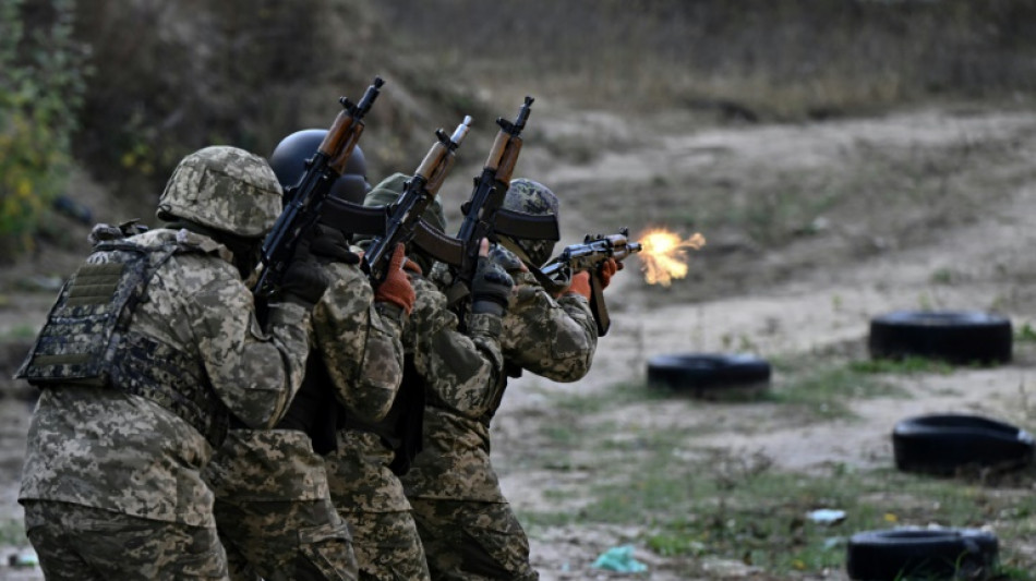 Tired of protest, Putin opponents take up arms in Ukraine 