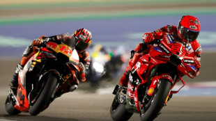 Marc Marquez survives brotherly shove to win Qatar MotoGP